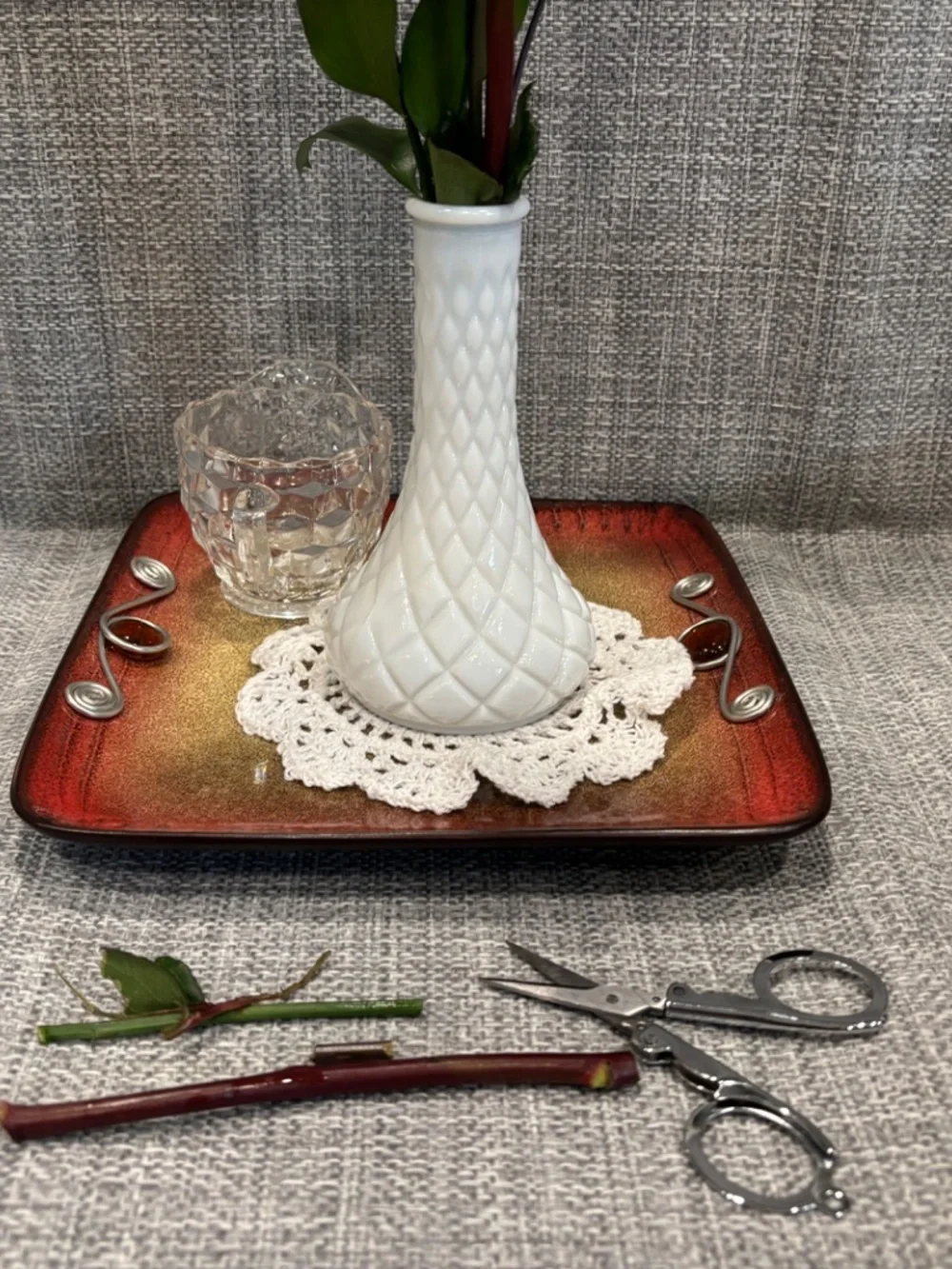 red tray flower arranging materials practical life lesson by idlewild montessori
